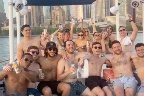 a group of people in the NYC Hot Tub Boat