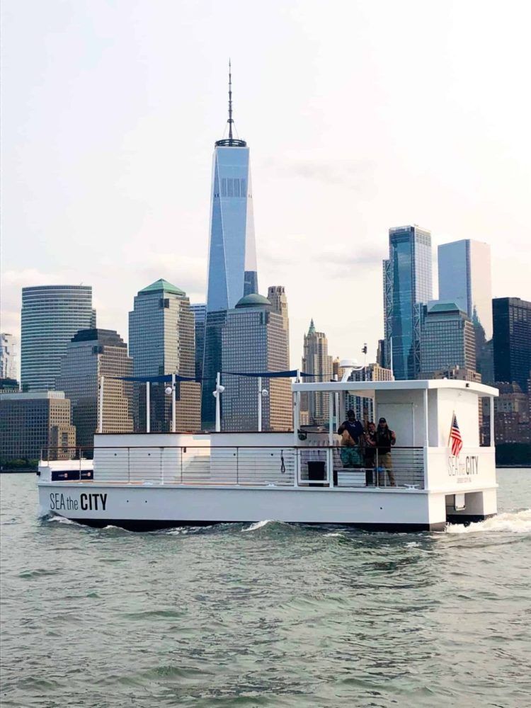 NYC Hot Tub Boat in front of the empire State Building