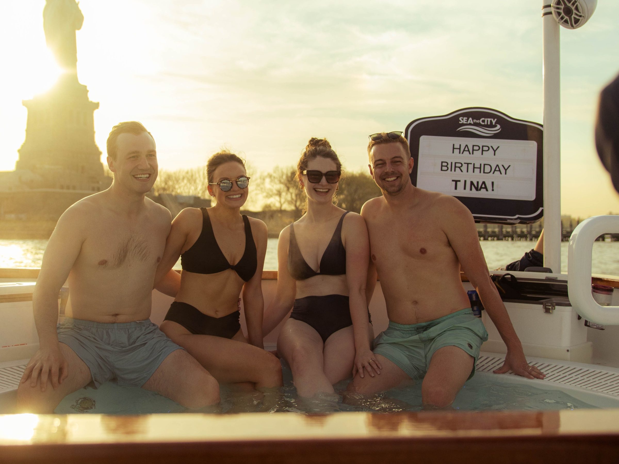 a group of people standing in front of a box