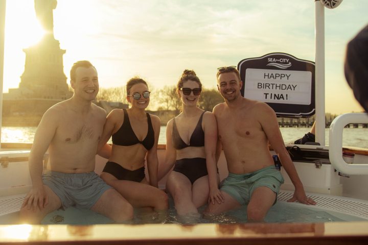 4 people in hot tub boat for birthday party in NYC